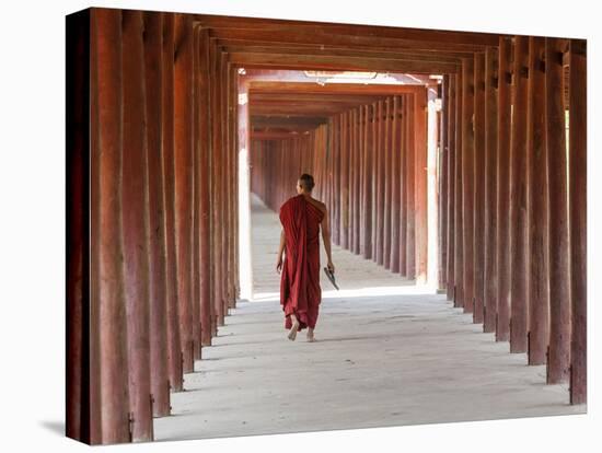 Monk in Walkway of Wooden Pillars To Temple, Salay, Myanmar (Burma)-Peter Adams-Premier Image Canvas