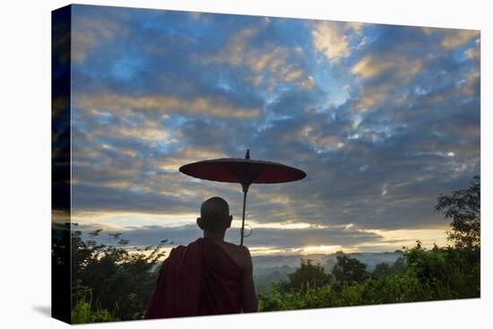 Monk watching ancient temple and pagoda at sunrise, Mrauk-U, Rakhine State, Myanmar-Keren Su-Premier Image Canvas