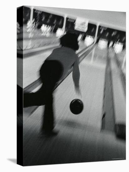 Monochromatic Image of a Woman Bowling-null-Premier Image Canvas