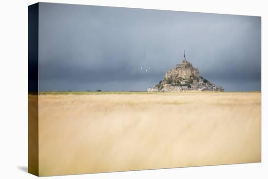 Mont Saint Michel under grey sky-Philippe Manguin-Premier Image Canvas