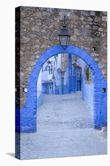 Morocco, Chefchaouen. a Blue Arch and Quiet Street Entering the Medina of the Village-Brenda Tharp-Premier Image Canvas