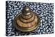 Morocco, Fes. A covered brass bowl with inlay of camel bone sites on a stone inlay table in a shop.-Brenda Tharp-Premier Image Canvas