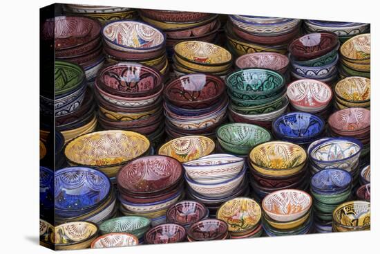 Morocco, Marrakech. Colorfully painted ceramic bowls for sale in a souk, a shop.-Brenda Tharp-Premier Image Canvas