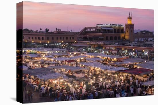 Morocco. Sunset over the famous Djemaa El-Fna square in Marrakech-Brenda Tharp-Premier Image Canvas