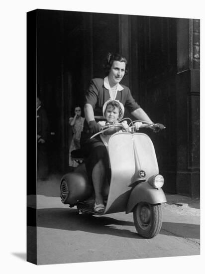 Mother and Baby Riding a Vespa Scooter-Dmitri Kessel-Premier Image Canvas
