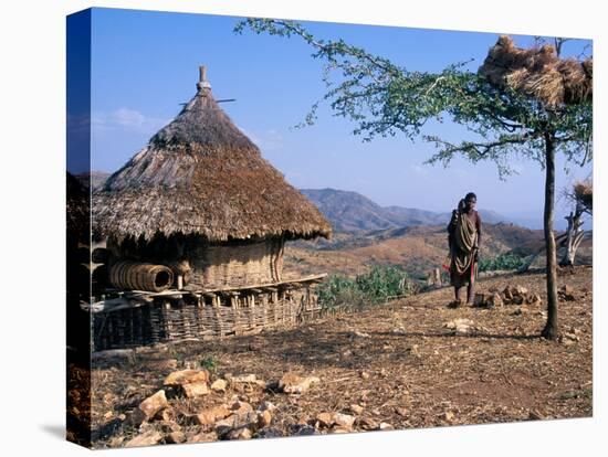 Mother and Child Walk Through a Konso Village, Omo River Region, Ethiopia-Janis Miglavs-Premier Image Canvas