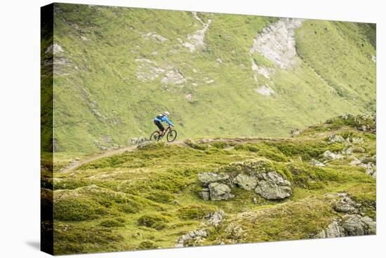 Mountain Biker In The Swiss Alps-Axel Brunst-Premier Image Canvas