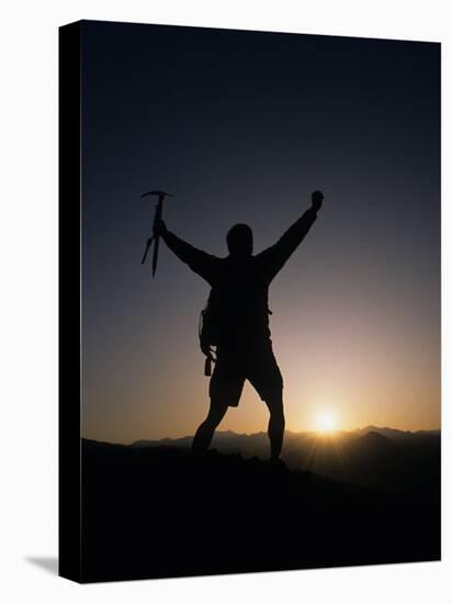 Mountain Climber Rejoices at the Summit at Sunrise-null-Premier Image Canvas