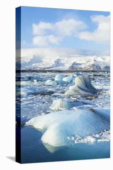 Mountains Behind the Icebergs Locked in the Frozen Water of Jokulsarlon Iceberg Lagoon-Neale Clark-Premier Image Canvas