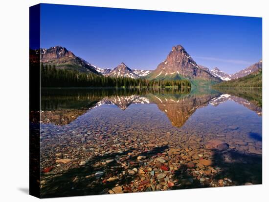 Mountains Reflect into Calm Two Medicine Lake, Glacier National Park, Montana, USA-Chuck Haney-Premier Image Canvas