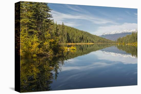 Mountains reflected in a lake along Valley of Five Lakes trail, Jasper National Park, UNESCO World -Jon Reaves-Premier Image Canvas