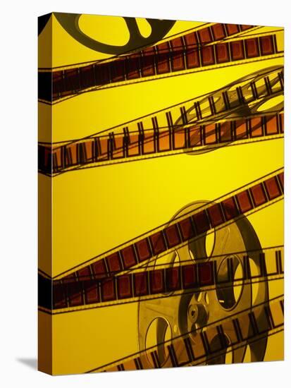 Movie Film and Reel in Yellow Light-null-Premier Image Canvas