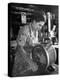 Mrs. Edison Risser Using Hand Operated Butter Making Machine-George Silk-Premier Image Canvas