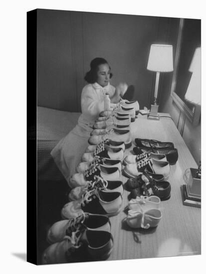 Mrs. Ottilie King Lining Up Her Children's Shoes-Stan Wayman-Premier Image Canvas