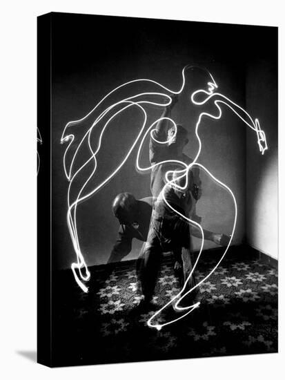 Multiple Exposure of Artist Pablo Picasso Using Flashlight to Make Light Drawing of a Figure-Gjon Mili-Premier Image Canvas