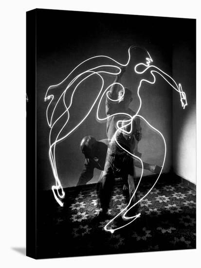 Multiple Exposure of Artist Pablo Picasso Using Flashlight to Make Light Drawing of a Figure-Gjon Mili-Premier Image Canvas