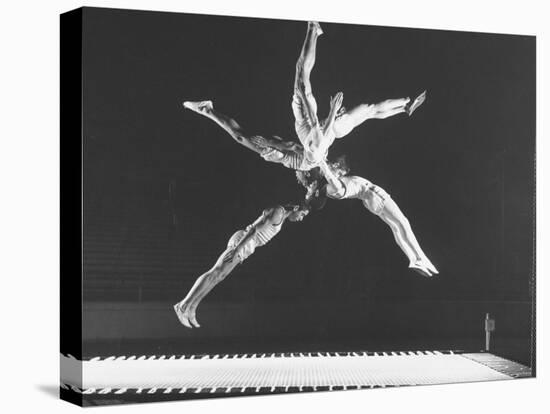 Multiple Exposure Shot of a Gymnast Jumping on a Trampoline-J^ R^ Eyerman-Premier Image Canvas