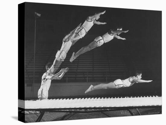Multiple Exposure Shot of a Gymnast Jumping on a Trampoline-J^ R^ Eyerman-Premier Image Canvas