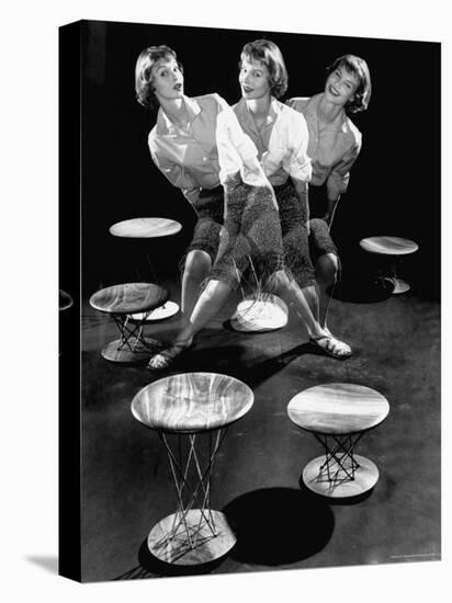 Multiple Exposure Showing Woman Oscillating on a Teeter Seat Designed by Isamu Noguchi-Eliot Elisofon-Premier Image Canvas