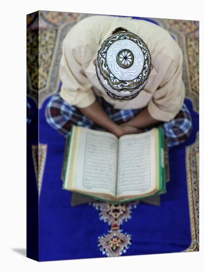 Muslim Man Reading the Quran in Mosque, Ho Chi Minh City, Vietnam, Indochina, Southeast Asia, Asia-null-Premier Image Canvas