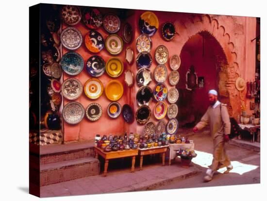 Muslim Man Walks by Wall of Moroccan Pottery, Marrakech, Morocco-John & Lisa Merrill-Premier Image Canvas