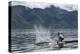 Myanmar, Inle Lake. Man Slaps His Paddle on the Surface of the Lake to Stun the Fish-Brenda Tharp-Premier Image Canvas