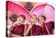 Myanmar, Mandalay Division, Bagan. Portrait of Three Novice Monks under Red Umbrellas (Mr)-Matteo Colombo-Premier Image Canvas