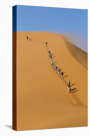 Namibia, Namib-Naukluft National Park, Sossusvlei. Tourists climbing Dune 45.-Ellen Goff-Premier Image Canvas