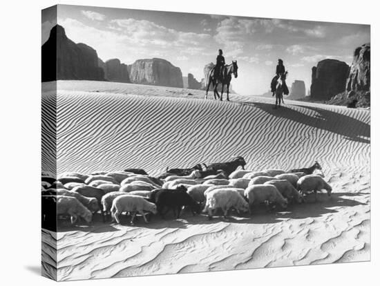 Native American Indians Herding their Sheep Through Desert-Loomis Dean-Premier Image Canvas