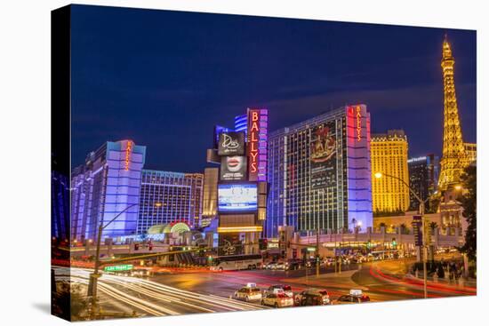 Neon Lights on Las Vegas Strip at Dusk with Car Headlights Leaving Streaks of Light-Eleanor Scriven-Premier Image Canvas