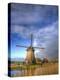 Netherlands, Nord Holland, Windmill along canal-Terry Eggers-Premier Image Canvas