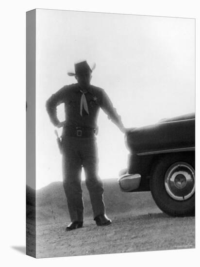 Nevada Sheriff Standing Against the Light from an Atomic Blast 40 Miles Away-George Silk-Premier Image Canvas