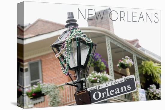 New Orleans, Louisiana - Building and Signpost-Lantern Press-Stretched Canvas