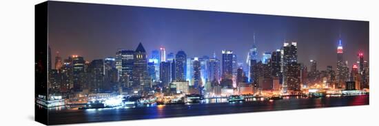 New York City Manhattan Midtown Skyline at Night with Skyscrapers Lit over Hudson River with Reflec-Songquan Deng-Premier Image Canvas