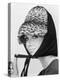 Nicole de la Marge in an Otto Lucas Jersey Scarf over an Ocelot Hat, 1964-John French-Premier Image Canvas