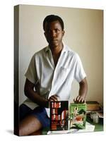 Nigerian Author Chinua Achebe Holding Two Editions of His Book Things Fall Apart-Eliot Elisofon-Premier Image Canvas