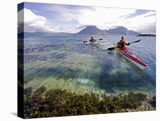 Nordland, Helgeland, Sea Kayakers Explore Calm Coastal Waters of Southern Nordland, Norway-Mark Hannaford-Premier Image Canvas