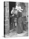 Nun from the Order of Sisters of Charity Visiting a Destitute Family with Supplies-null-Premier Image Canvas