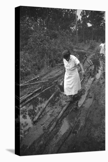 Nurse Maude Callen Carrying Her Medical Bag Along a Muddy Road after Caring for a Patient, 1951-W^ Eugene Smith-Premier Image Canvas