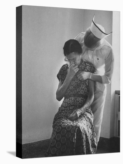 Nurse Trying to Comfort an Elderly Patient-Carl Mydans-Premier Image Canvas