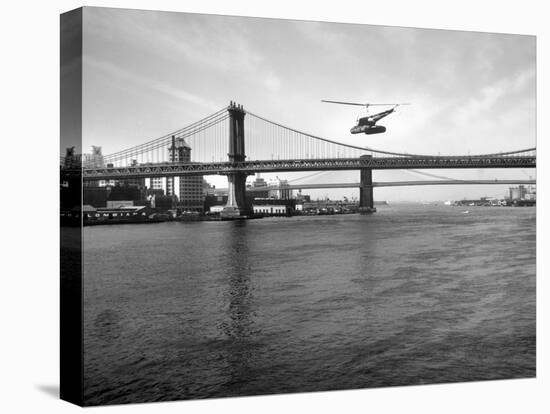 NYC Police Helicopter Hovering over the East River Next to the Manhattan Bridge-null-Premier Image Canvas