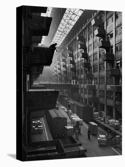 Off-Loaded Freight From Box Cars Being Hoisted Up to Jutting Loading Platforms, Brooklyn Army Base-Andreas Feininger-Premier Image Canvas