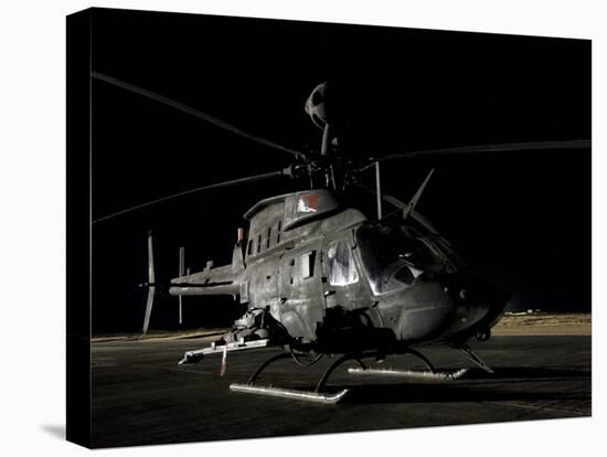 OH-58D Kiowa Sits on its Pad at Night-Stocktrek Images-Premier Image Canvas