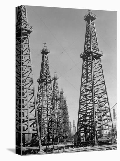 Oil Well Rigs in a Texaco Oil Field-Margaret Bourke-White-Premier Image Canvas