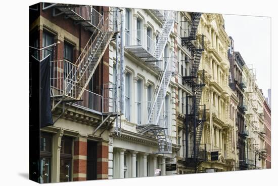 Old buildings and fire escapes in the Cast Iron District of SoHo, Manhattan, New York City, United -Fraser Hall-Premier Image Canvas