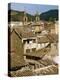 Old Buildings with Tiled Roofs and a Church Behind at Estella on the Camino in Navarre, Spain-Ken Gillham-Premier Image Canvas