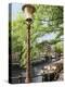 Old Gas Lamp Post and Bicycles on a Bridge over a Canal in Amsterdam, the Netherlands-Miva Stock-Premier Image Canvas