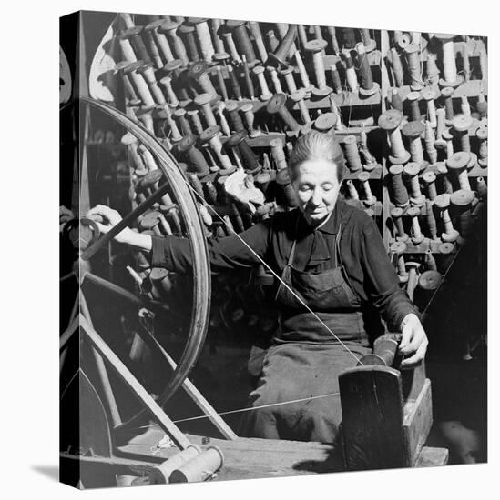 Old Lady at a Time Worn Wheel Winding Strands for Tapestries at Aubusson, France June 1946-David Scherman-Premier Image Canvas