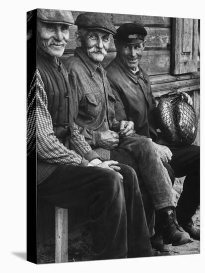 Old Men Smiling, Sitting on Bench, After Waiting in Line For Meat-Paul Schutzer-Premier Image Canvas