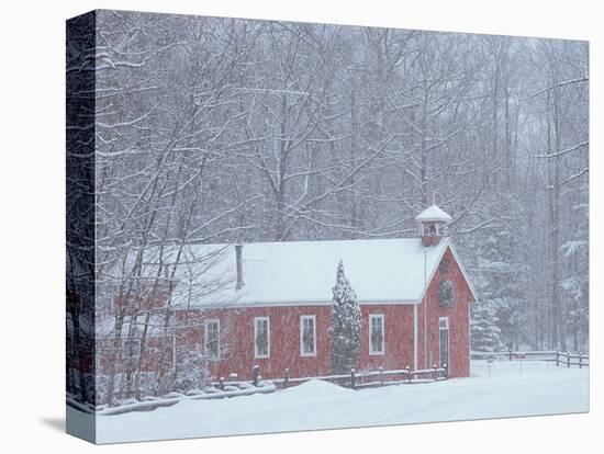Old Red Schoolhouse and Forest in Snowfall at Christmastime, Michigan, USA-Mark Carlson-Premier Image Canvas